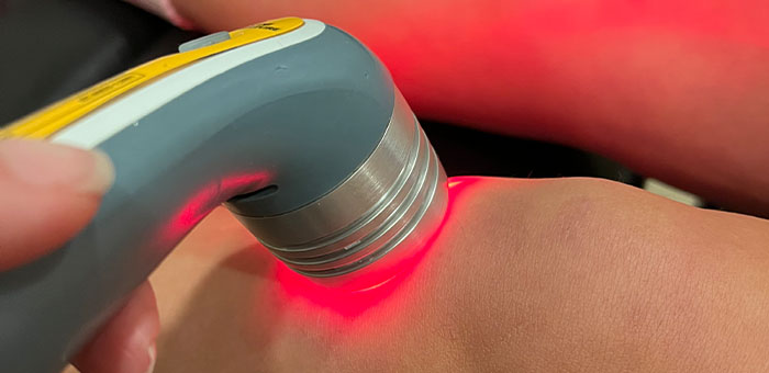 patient receiving laser therapy in Ontario