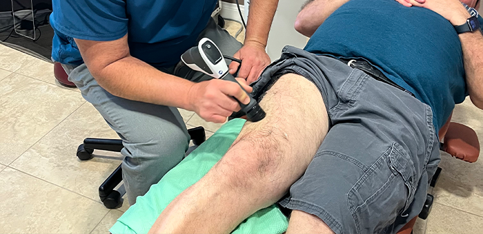 patient receiving shockwave therapy in Ontario