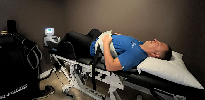 patient receiving spinal decompression in Ontario