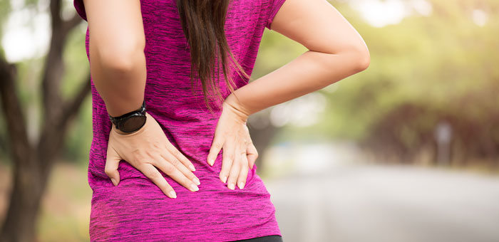 patient needing back pain treatment in Ontario