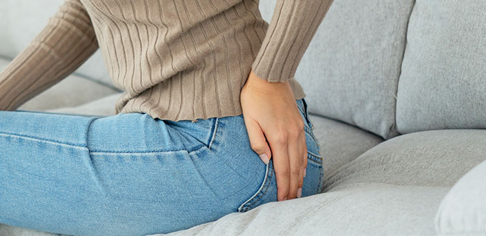 patient needing tailbone pain treatment in Ontario